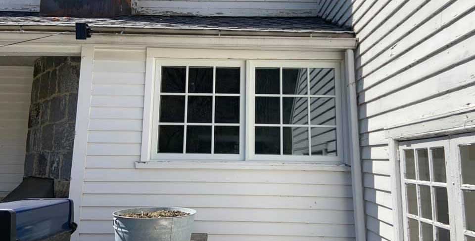 Replaced the old wood window with a new Marvin Brand custom size with interior and exterior trim